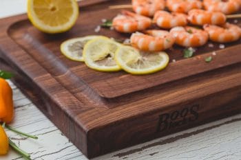 Pro Chef Black Walnut cutting board with juice groove and recessed grips; can be used on both sides 19